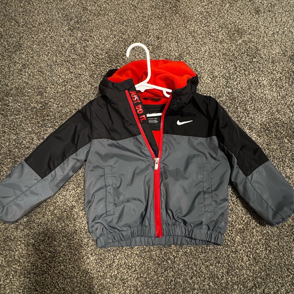 Nike Kids Black and Gray Raincoat with Red Accents